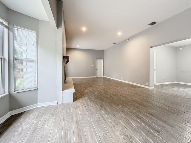 unfurnished living room with light hardwood / wood-style flooring