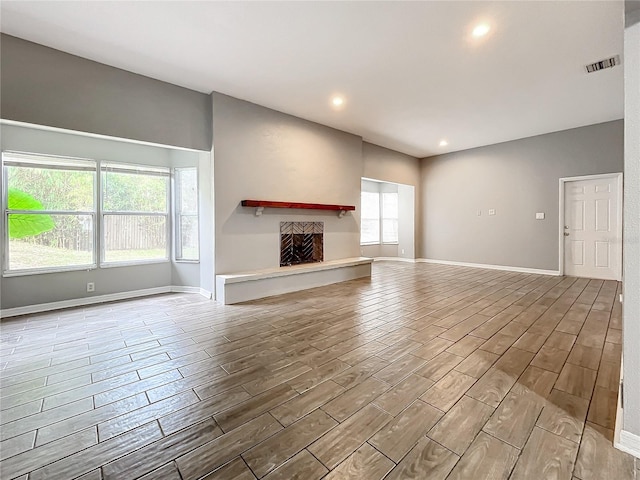 unfurnished living room featuring light hardwood / wood-style flooring