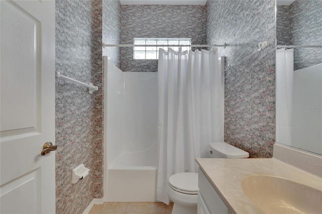 full bathroom featuring tile patterned floors, vanity, shower / bath combination with curtain, and toilet