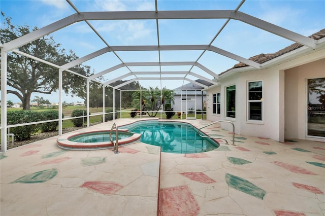 view of swimming pool with a lanai, an in ground hot tub, and a patio