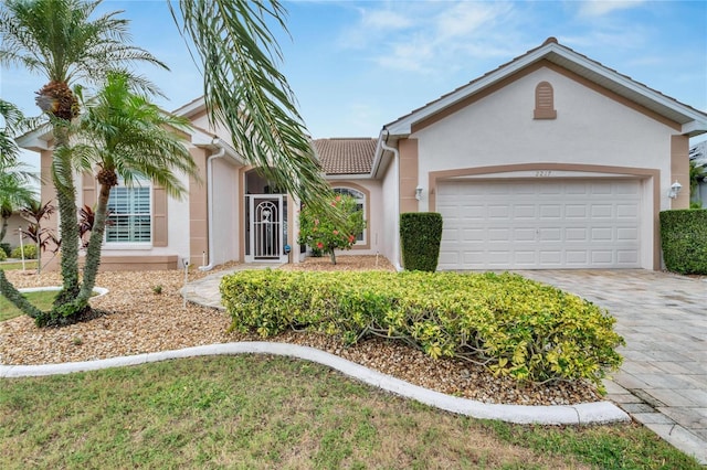 single story home with a garage