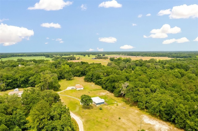 birds eye view of property with a rural view