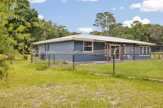 ranch-style home with a front yard