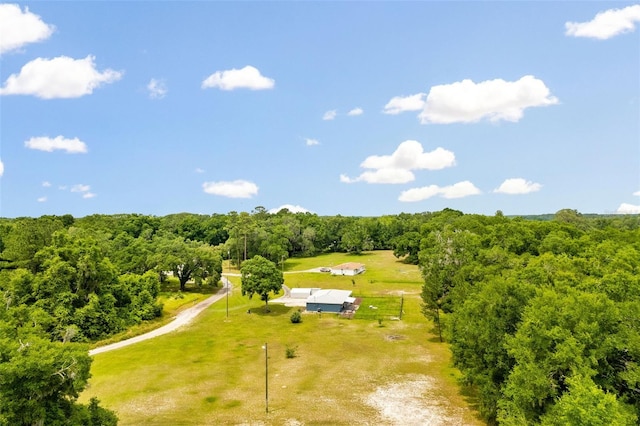 birds eye view of property featuring a rural view