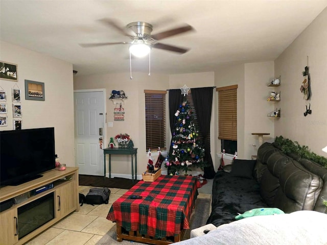 2302 Maki Rd Unit 5, Plant City, FL 33563 - living area with a ceiling fan and light tile patterned floors