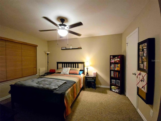 bedroom with ceiling fan and light colored carpet