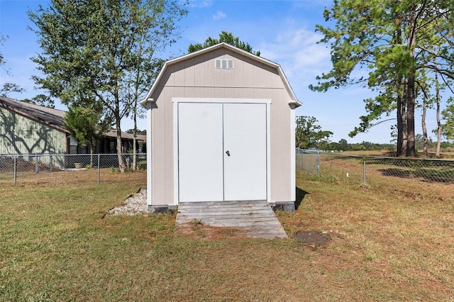 view of outdoor structure featuring a yard