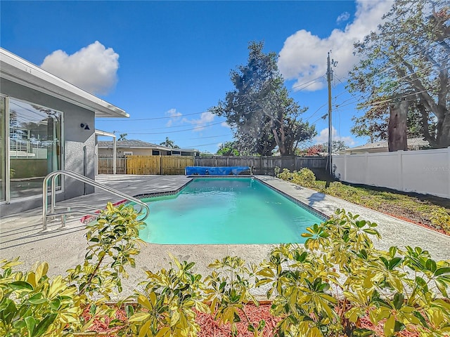 view of pool with a patio area