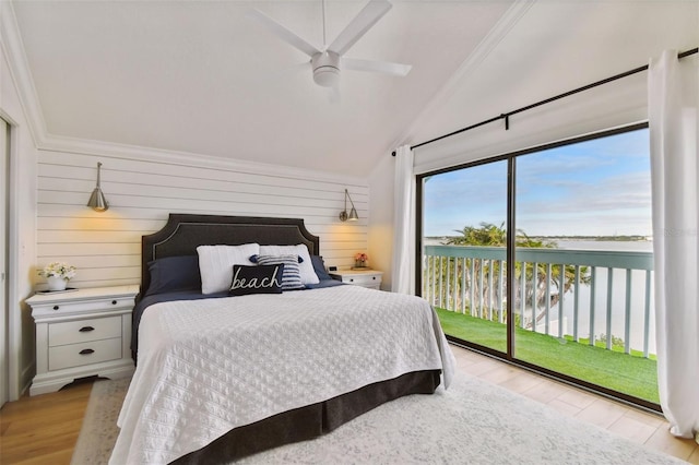 bedroom with access to exterior, ceiling fan, a water view, and light hardwood / wood-style floors