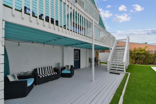 deck featuring a yard