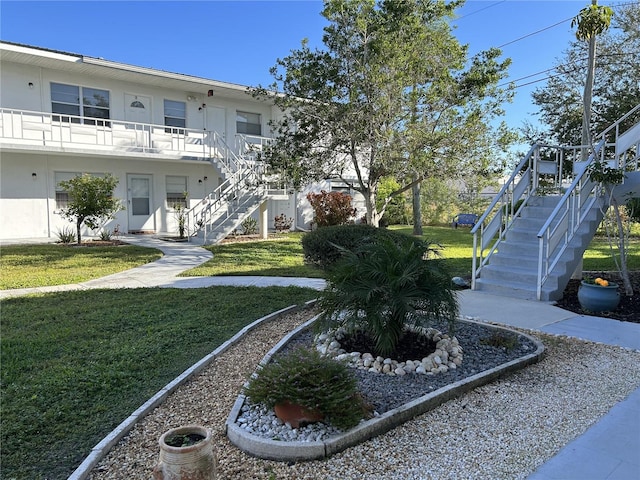 view of community with a lawn