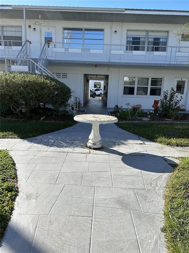 exterior space with a carport