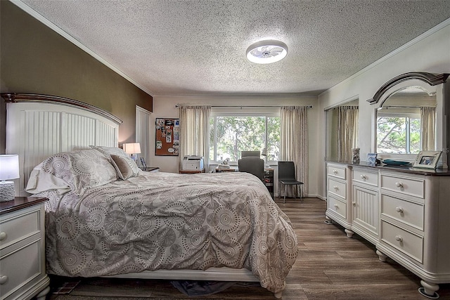 bedroom with a textured ceiling, multiple windows, crown molding, and dark hardwood / wood-style floors