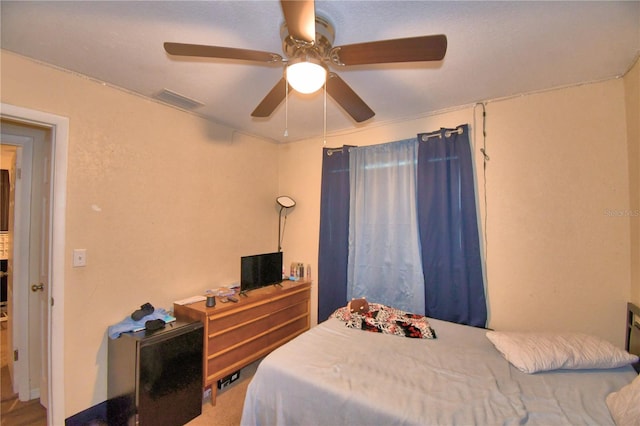 bedroom featuring ceiling fan