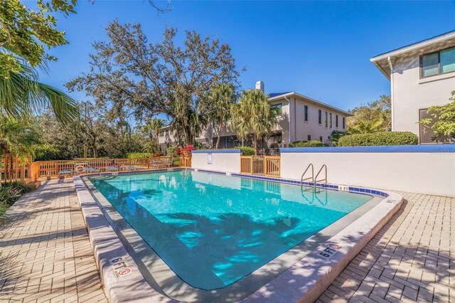 community pool with fence