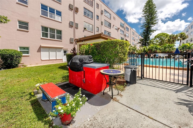 exterior space featuring a grill and a yard