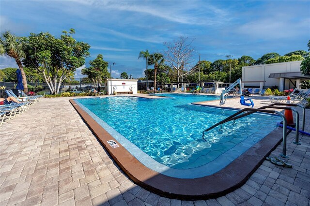 5501 80th St N Unit 214, Saint Petersburg, FL 33709 - community pool with a patio area