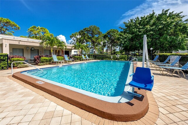 5501 80th St N Unit 214, Saint Petersburg, FL 33709 - community pool with a patio
