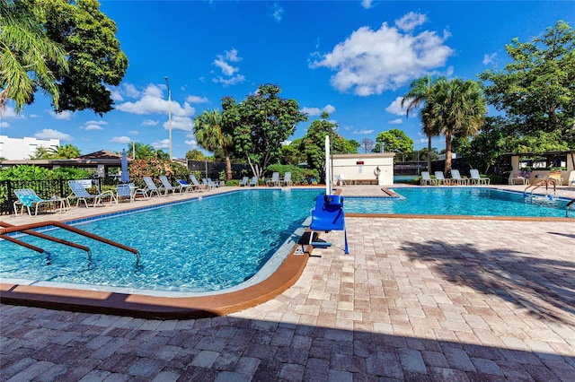 view of swimming pool featuring a patio area