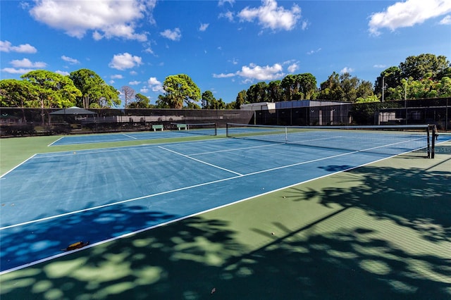 view of tennis court with basketball court