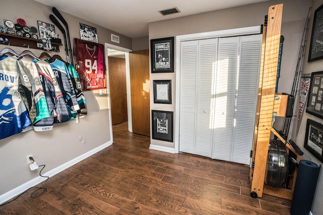 foyer entrance featuring dark hardwood / wood-style flooring