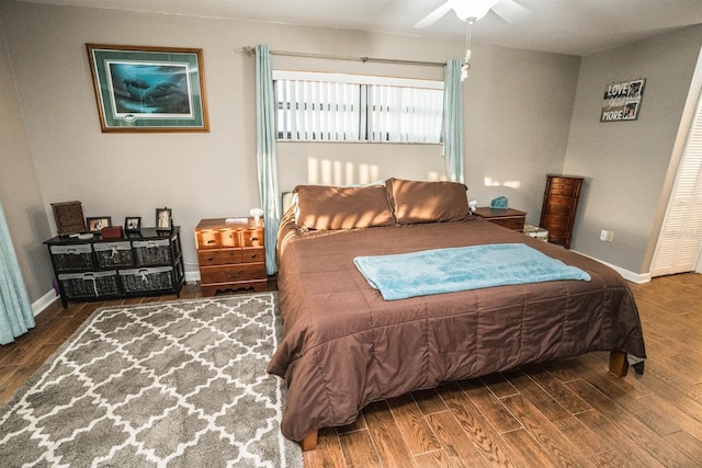 bedroom featuring wood-type flooring and ceiling fan