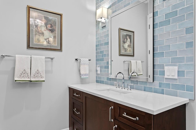 bathroom featuring decorative backsplash and vanity