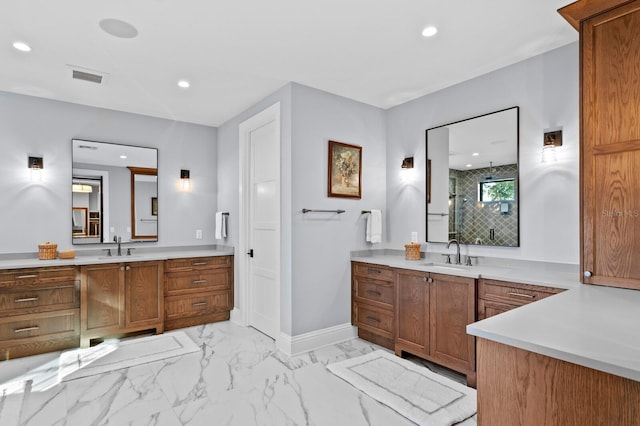 bathroom featuring walk in shower and vanity