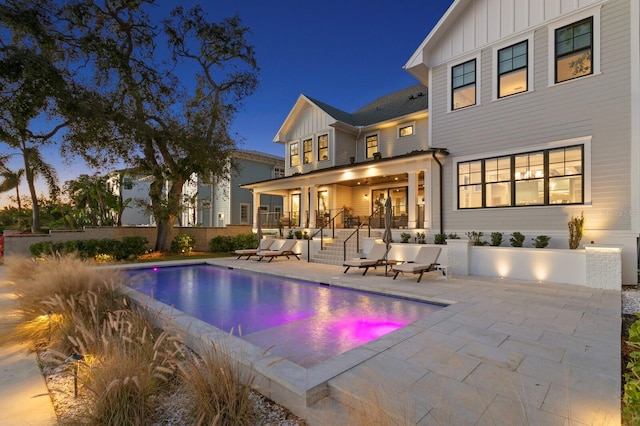 view of pool featuring a patio area