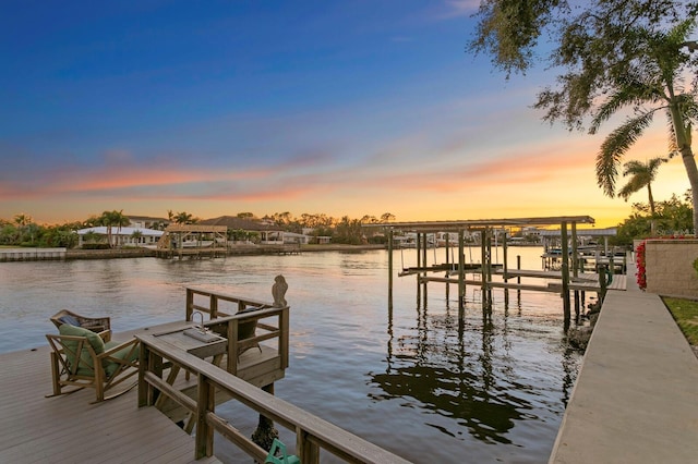 dock area featuring a water view