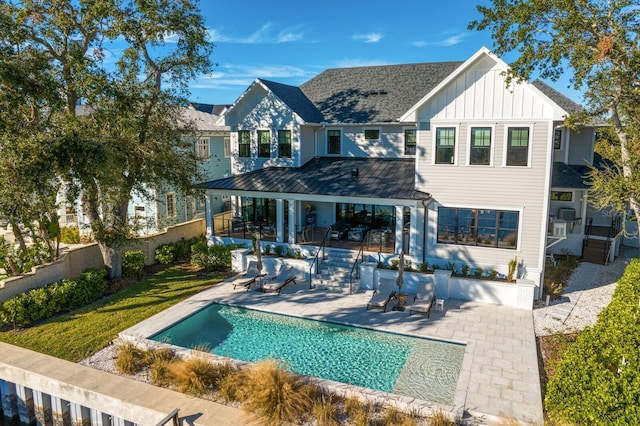 rear view of property with a patio area