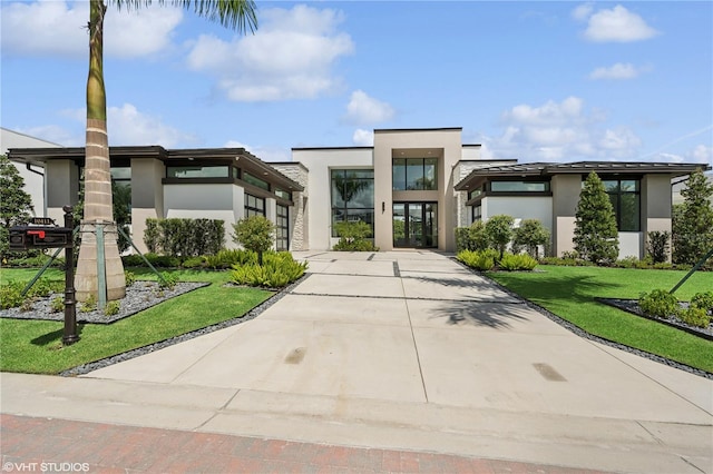 modern home with a front yard