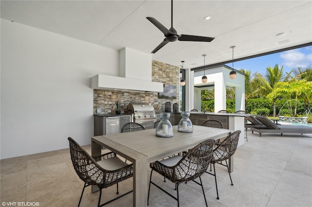 view of patio / terrace with exterior bar, a grill, ceiling fan, a pool, and area for grilling