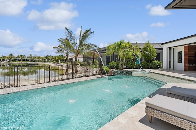 view of swimming pool featuring pool water feature and a water view