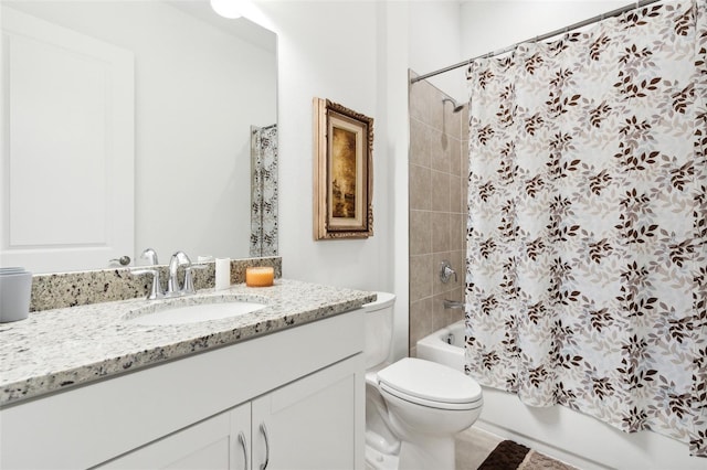 full bathroom featuring vanity, toilet, and shower / bathtub combination with curtain