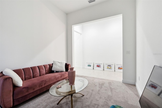 living room featuring light colored carpet