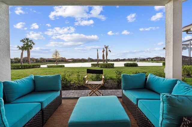 9132 Bernini Pl, Sarasota, FL 34240 - view of patio / terrace with outdoor lounge area and a water view