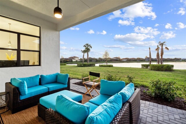 9132 Bernini Pl, Sarasota, FL 34240 - view of patio with outdoor lounge area and a water view