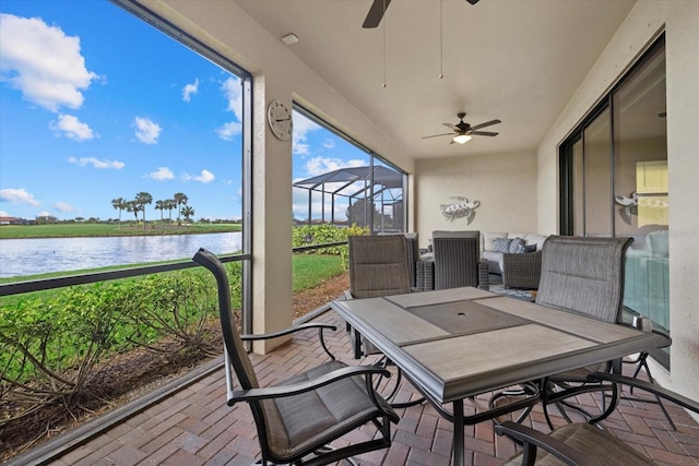 23503 Waverly Cir, Venice, FL 34293 - sunroom with a water view and ceiling fan