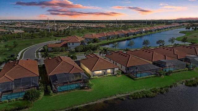 23503 Waverly Cir, Venice, FL 34293 - aerial view at dusk of a water view and a residential view