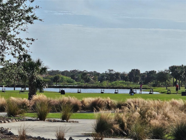 23503 Waverly Cir, Venice, FL 34293 - view of community featuring a water view and a yard