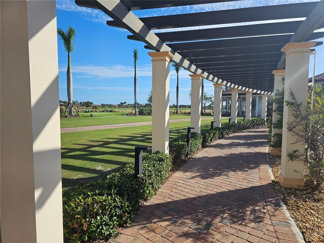 23503 Waverly Cir, Venice, FL 34293 - view of patio / terrace featuring a pergola