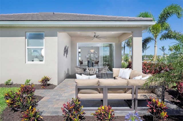 view of patio / terrace featuring an outdoor living space and ceiling fan