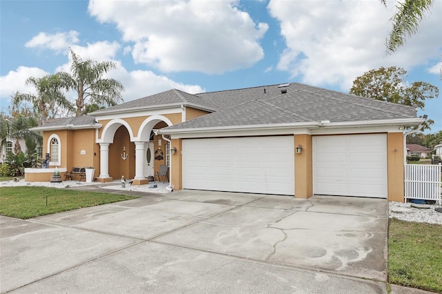 view of front of house with a garage