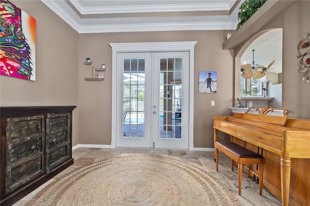 doorway to outside featuring french doors, ceiling fan, and ornamental molding