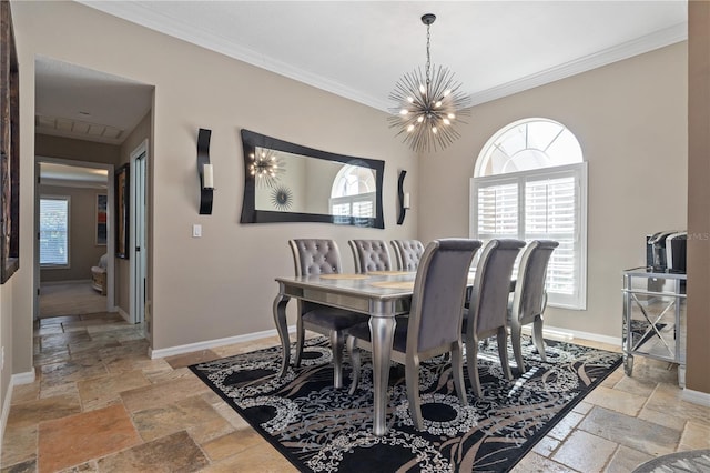 dining area with a notable chandelier and crown molding