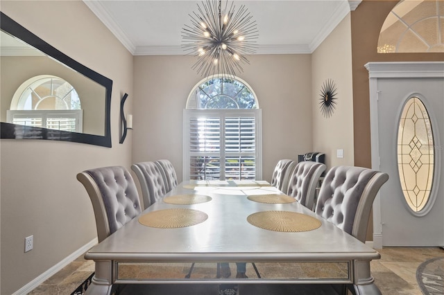 dining room with a chandelier, crown molding, and a healthy amount of sunlight