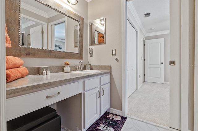 bathroom with vanity and crown molding