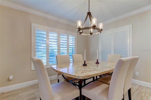 dining room featuring a chandelier and ornamental molding