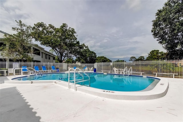 view of pool with a patio